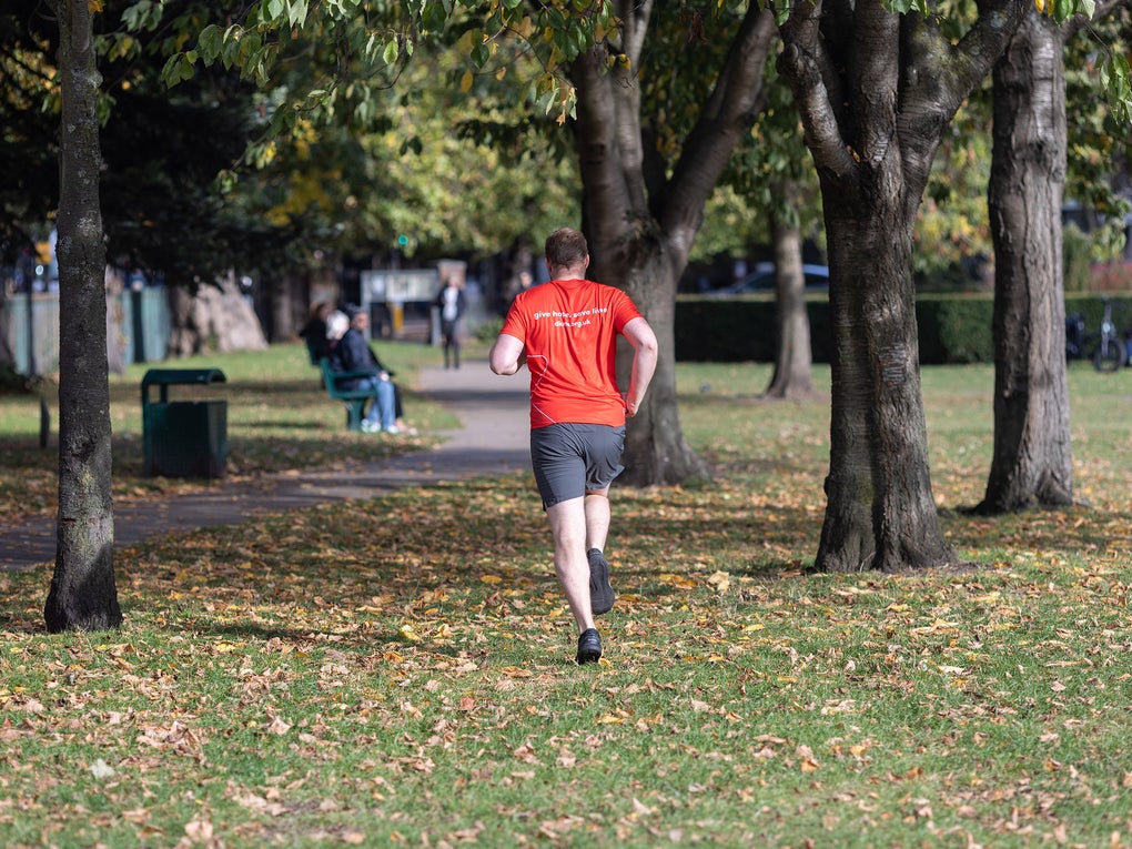 Man in red t-shirt running Man in red t-shirt running
