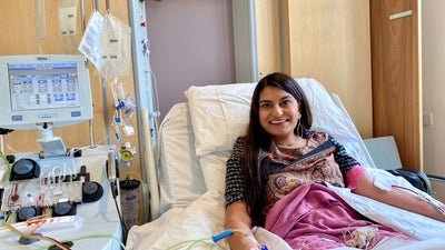 Poonam on a hospital bed during her stem cell donation