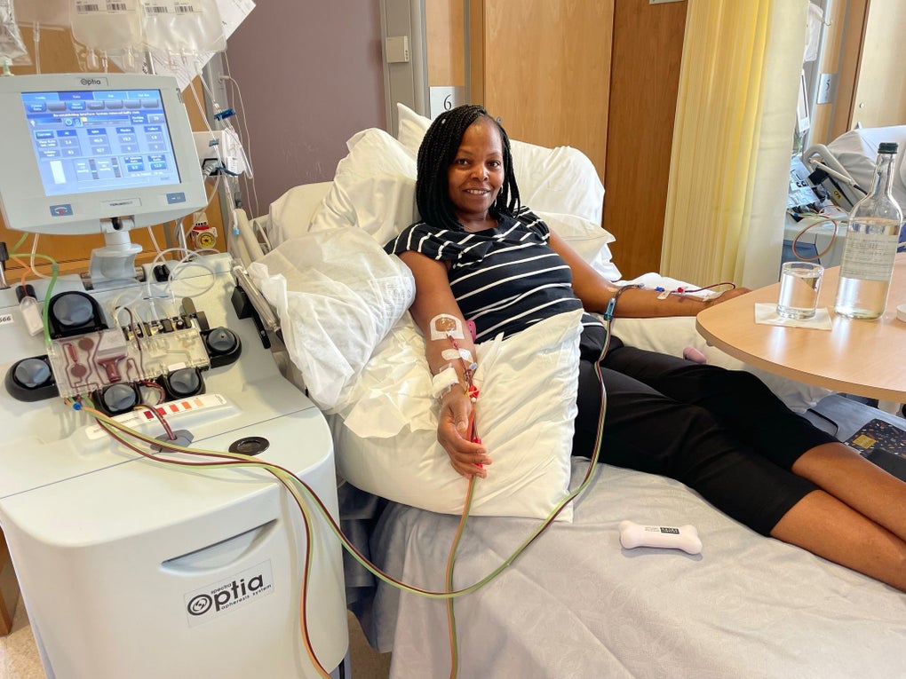 Purity giving her donation Purity giving her donation