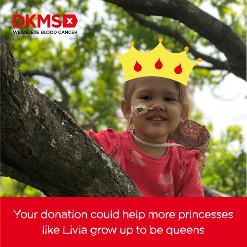 Livia climbing a tree with a crown