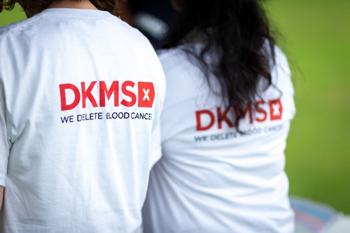 Image of white DKMS tshirts