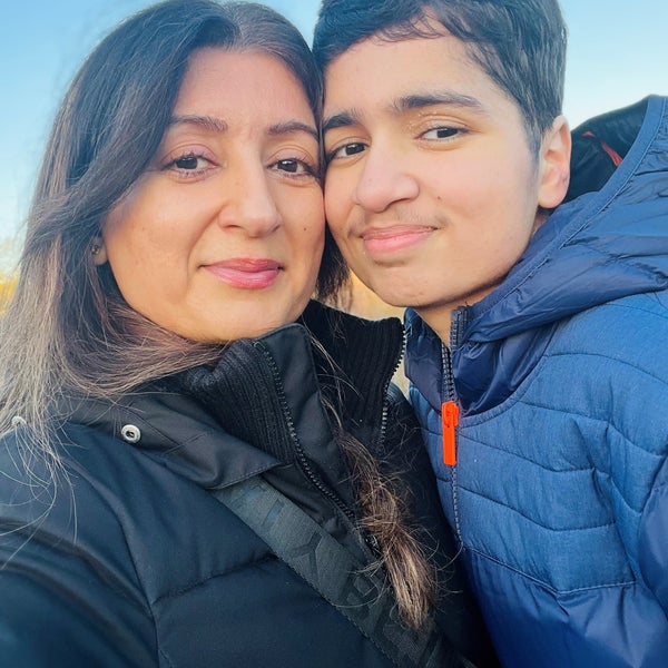 A selfie of a woman and her son A selfie of a woman and her son