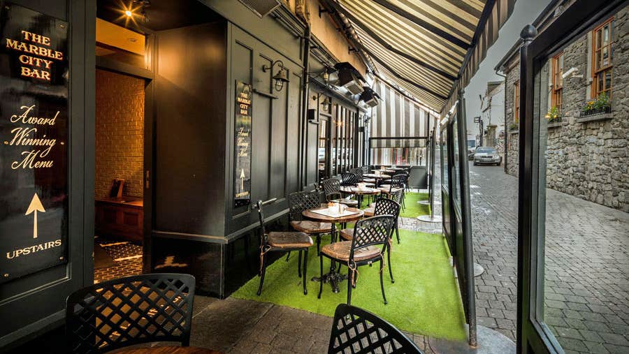 Entrance and seating area to Marble City Tearooms on Kieran Street Kilkenny