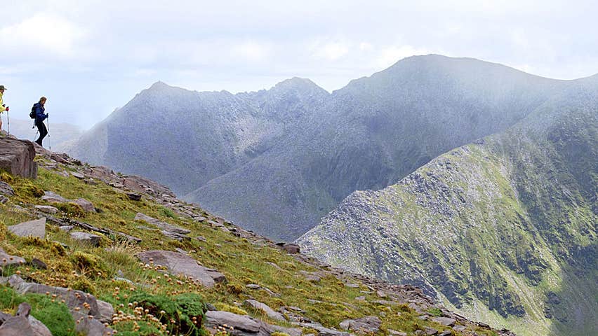Wilderness Ireland view of hikers in the mountains