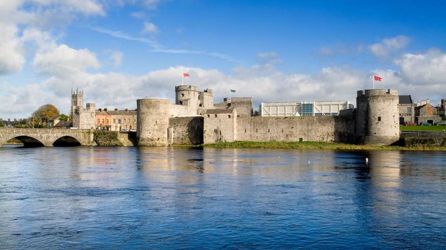 Blue skies with flags blowing at King John's Castle, Co. Limerick