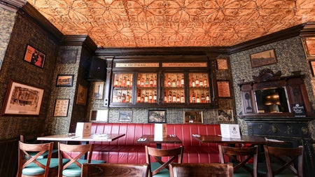 An interior view of the ceiling and wall décor in The Oval