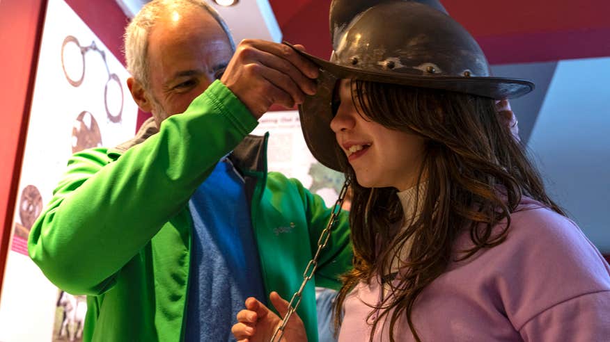 A man and girl in the Rathcroghan Visitor Centre in Co Roscommon