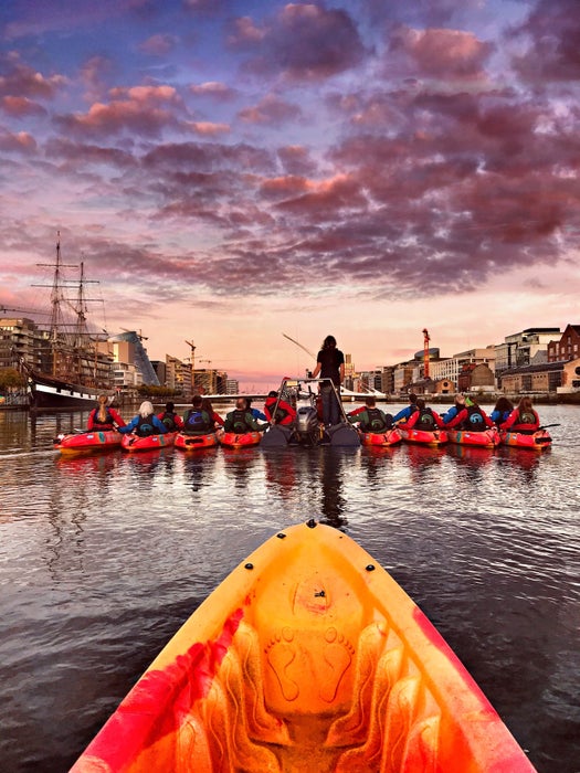 People kayaking on the River Liffey in Dublin city