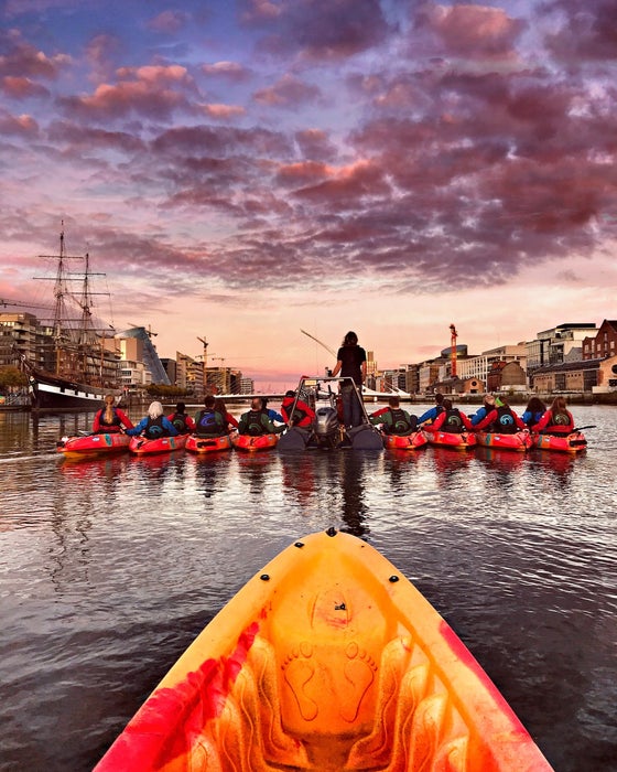 People kayaking on the River Liffey in Dublin city
