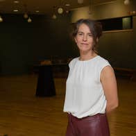 Laura Hyland in a large room.