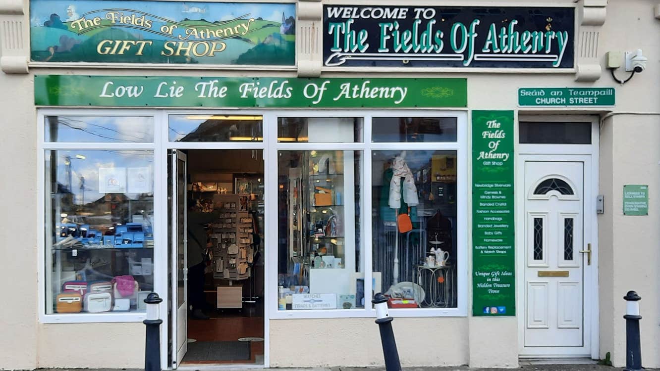 Front of The Fields of Athenry Gift Shop with stock displayed in window front