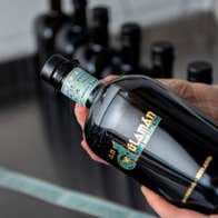 Image of black glass bottle