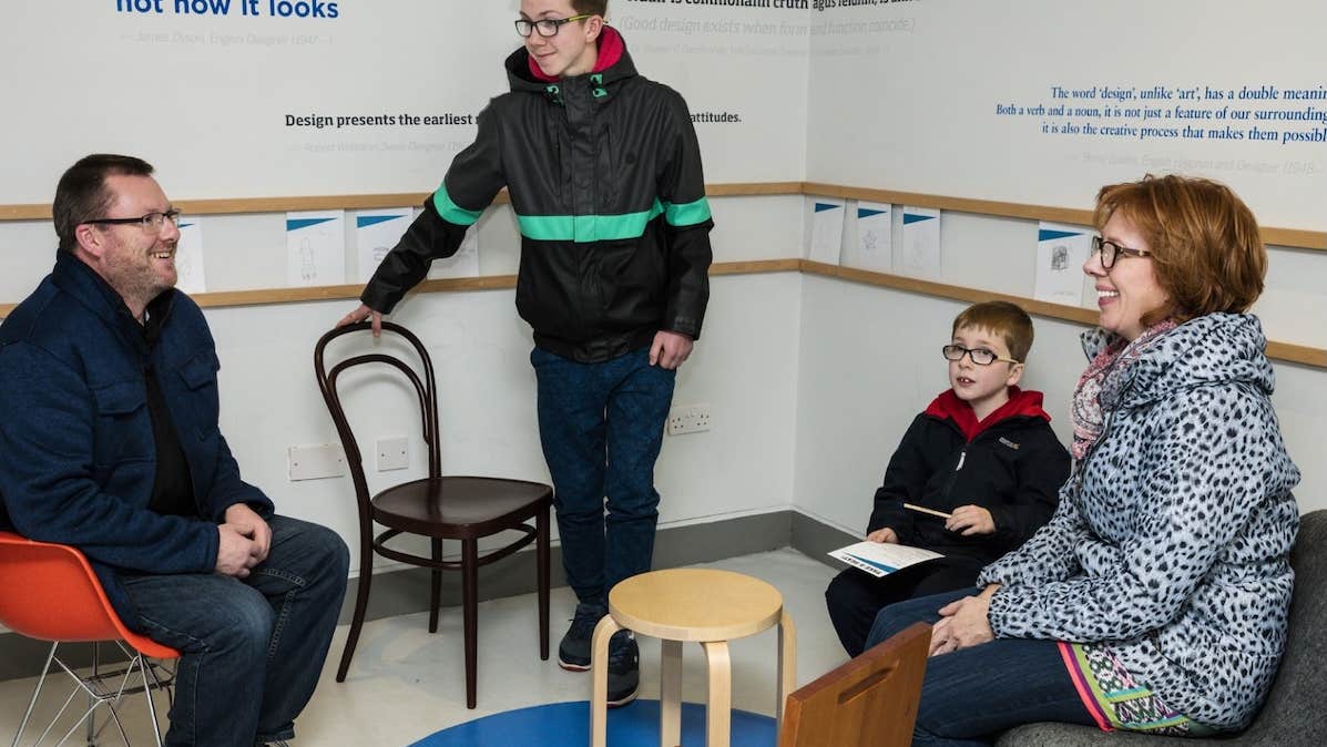 Image of a Family engaging with Take Your Seats gallery