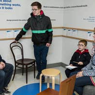 Image of a Family engaging with Take Your Seats gallery
