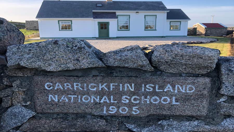 Exterior of house with stone wall entrance