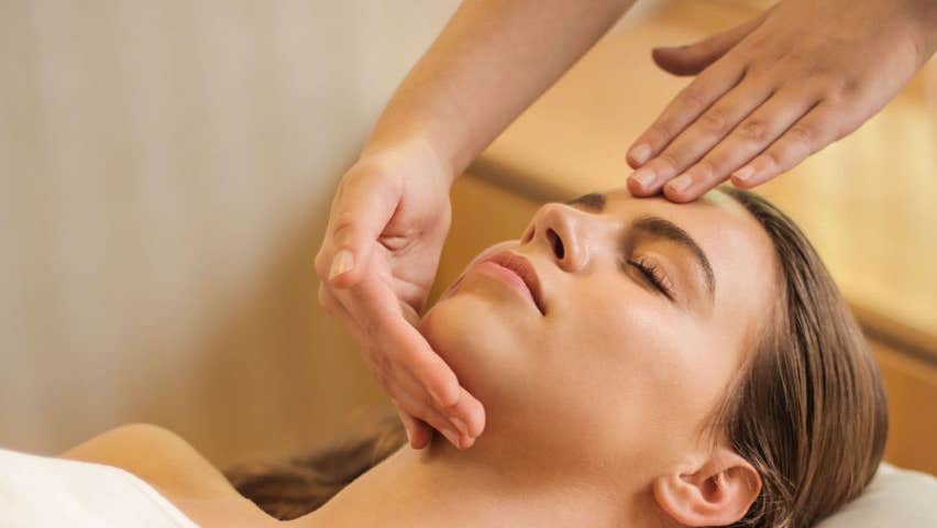 A lady relaxing with a facial massage at Balance Therapy Donegal
