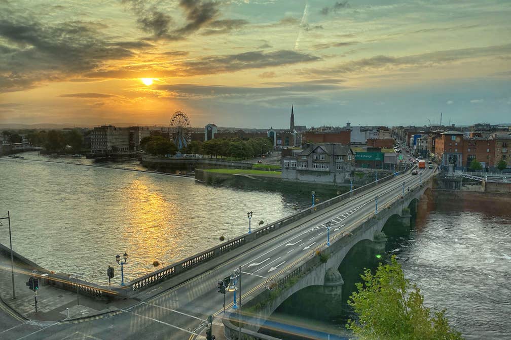 View of Limerick city at sunset from a hotel window