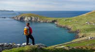 A hiker at Slea Head in County Kerry