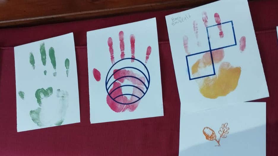 Earth Charter symbols with handprints