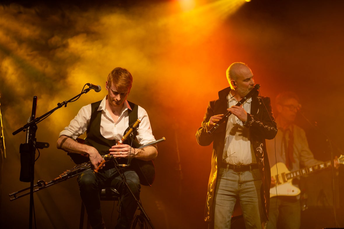 Three trad musicians performing at the 2022 Tradfest in Temple Bar in Dublin city