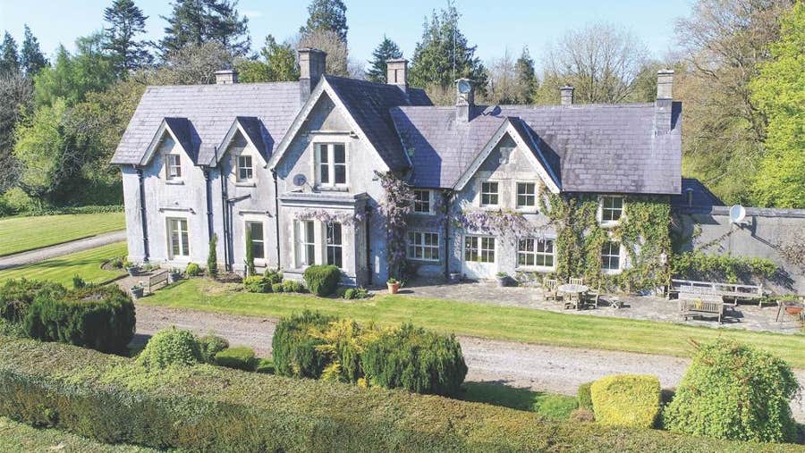 Front view of house and gardens