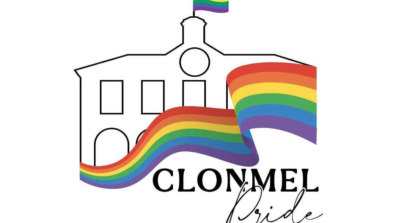 Black outline of a building with rainbow flag flying from chimney and across the front, against white background.