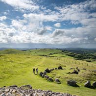 People exploring the Loughcrew Cairns in Co Meath