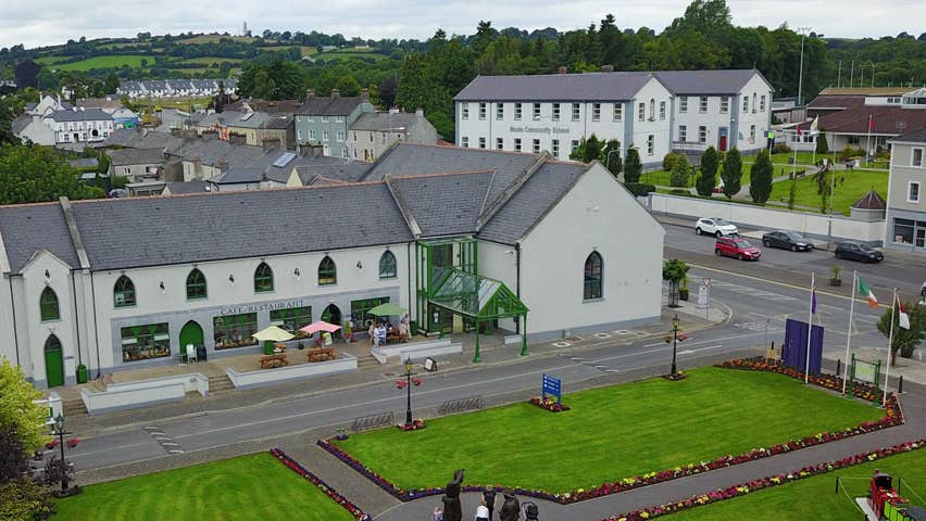 Aerial view of Tour Ard Theatre in front of the village green in Moate, County Westmeath