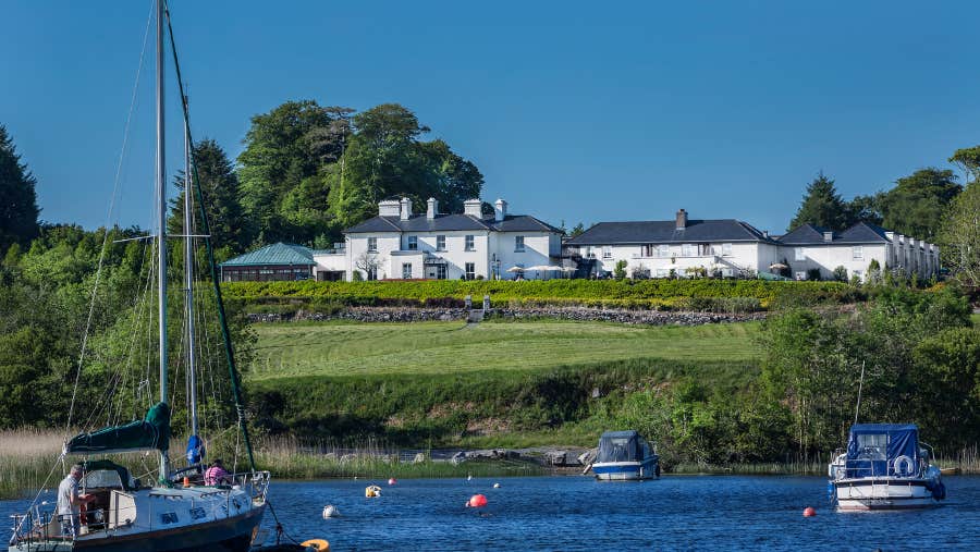 Water and boats with a view of the outside of the property