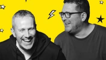 Black and white photo of 2 laughing men