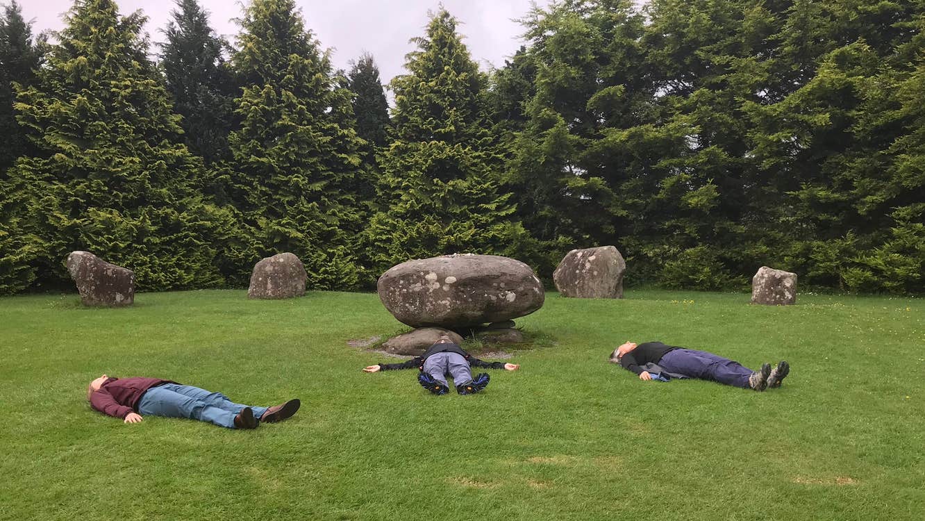 Group laying on grass
