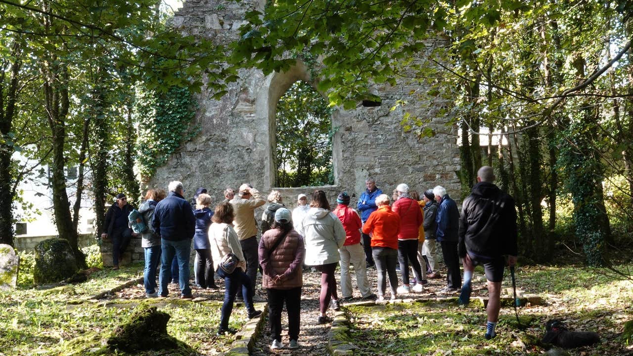A Clifden Historical Walking Tour group visiting Clifden Christ Church