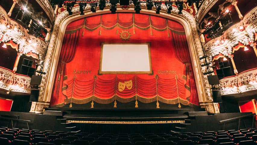A view of a theatre stage from the front row