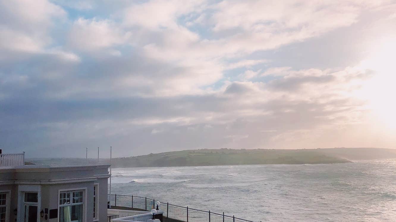 View from a house of the sea with land in the distance