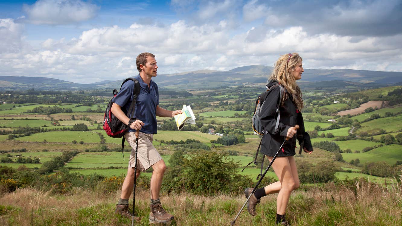 Couple hiking the Wicklow Way in the Wicklow Mountains in Ireland's Ancient East