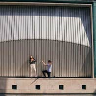 Woman and a man acting out a scene