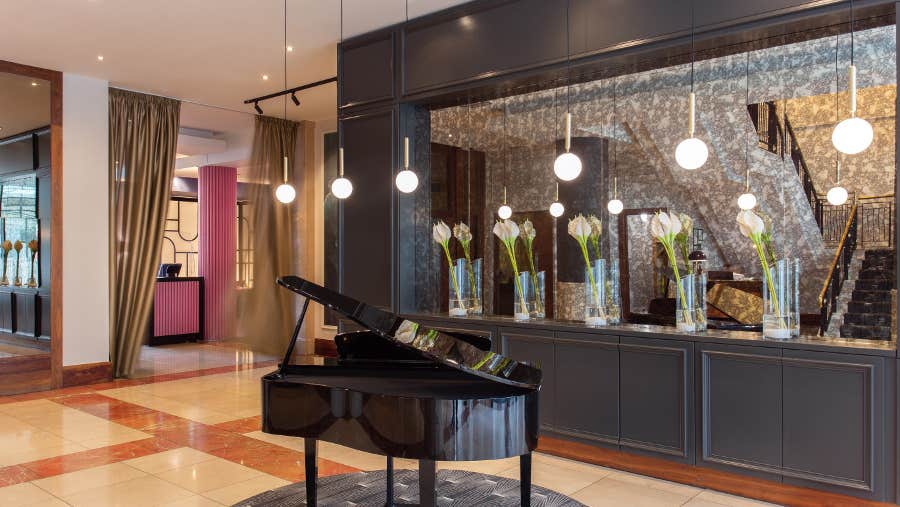 The loddy area with a piano