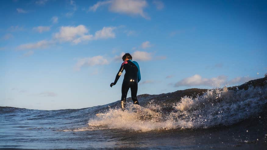 A surfer at Brittas Bay in Co Wicklow
