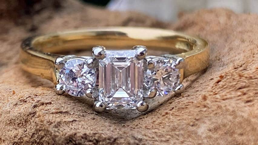 Diamond engagement ring set in gold band