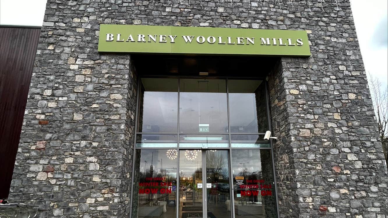 Exterior of a retail outlet with grey bricked walls