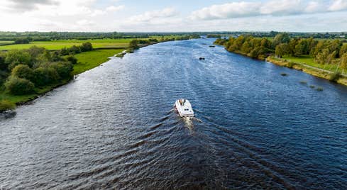 A boat cruising the River Shannon in Banagher in County Offaly.