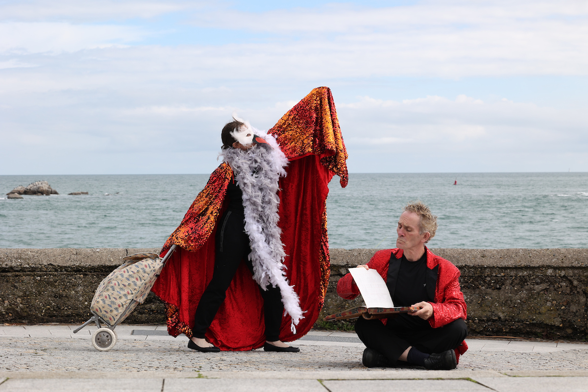 Two actors in costume performing