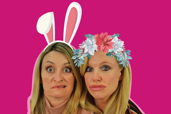 DIRTBIRDS: NO FILTERS live at The Everyman. Heads of 2 women close together making faces, one with rabbits ears on her head, the other a crown of blue and red flowers, against a dark pink background.