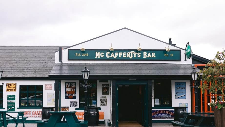 McCafferty's Bar, Lettermacaward. Front view of single storey building in white with dark green
