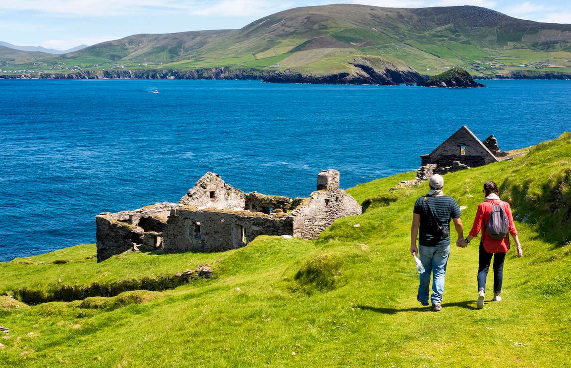 A couple exploring ruins on Great Blasket Island, Co Kerry