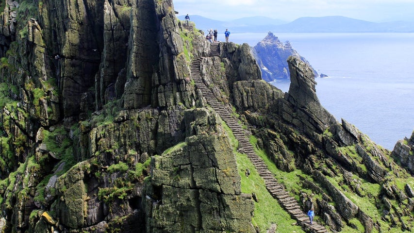 People climbing the steps on Skellig