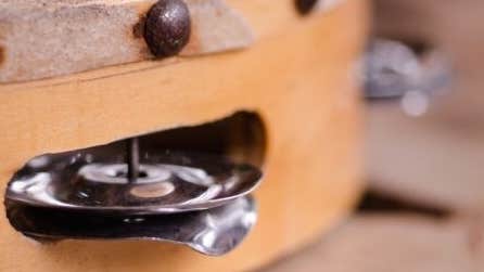 Close up view of the side of a tambourine.
