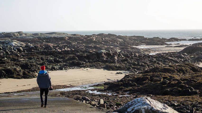 Person looking at view from Ballynahown Pier
