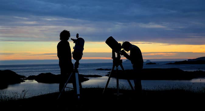 Image of two people looking at the stars in the Dark Sky Reserve in County Kerry