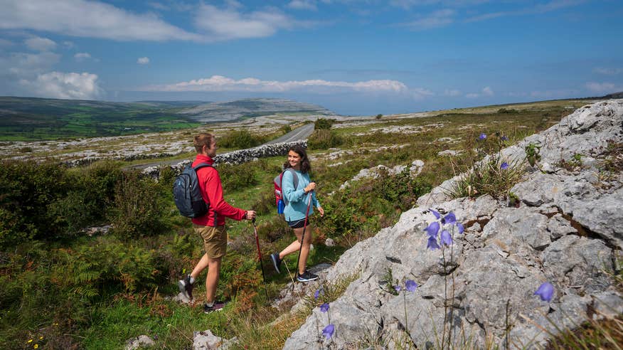 People hiking in the Burren in Co Clare